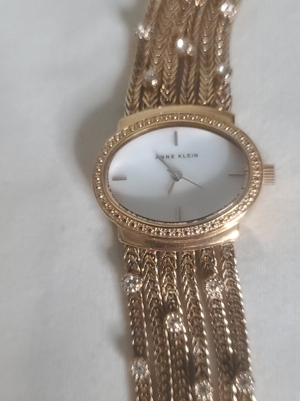 Anne Klein Gold Tone Crystal-Embellished Oval Dial Bracelet Watch